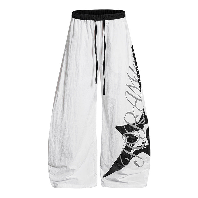 Women's Wide Palazzo Trousers with Drawstring Waist and Large Statement Print Chichicherry