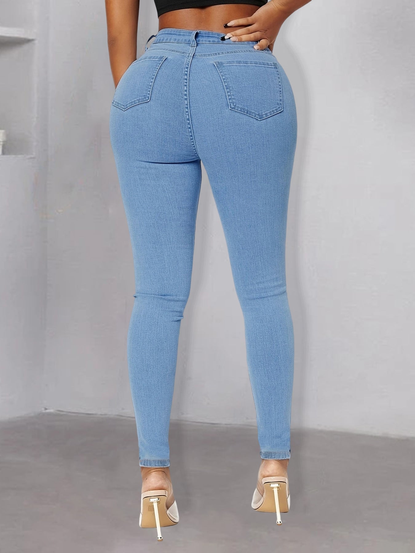 Women pearl-embellished high-waist skinny jeans with knee cutouts Chichicherry