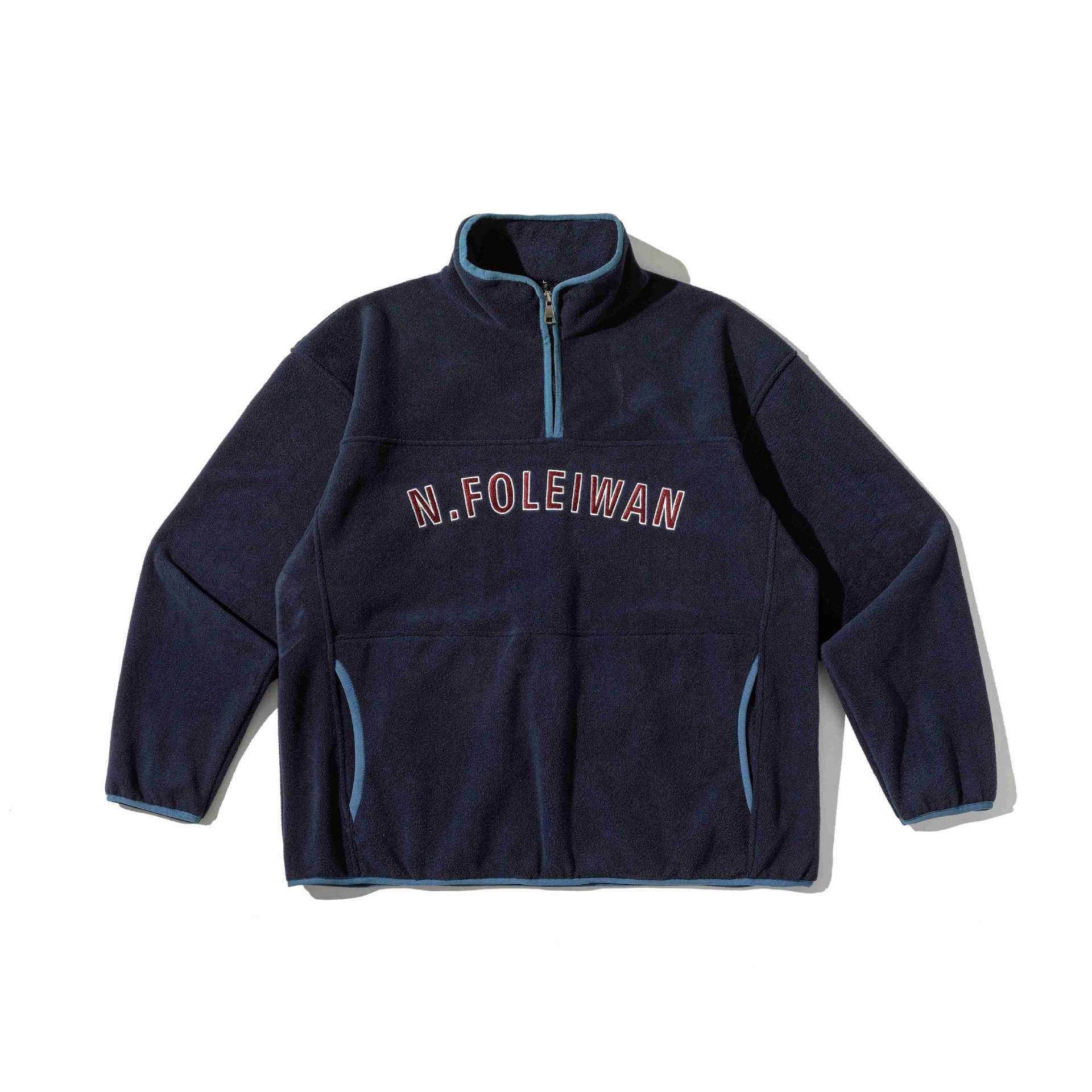 Unisex Fleece Pullover with half high zipper, kangaroo pocket and college style embroidery Chichicherry