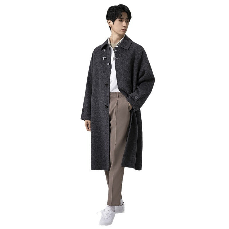 Men's floor-length wool blend coat in oversized cut with distinctive hook closures Chichicherry