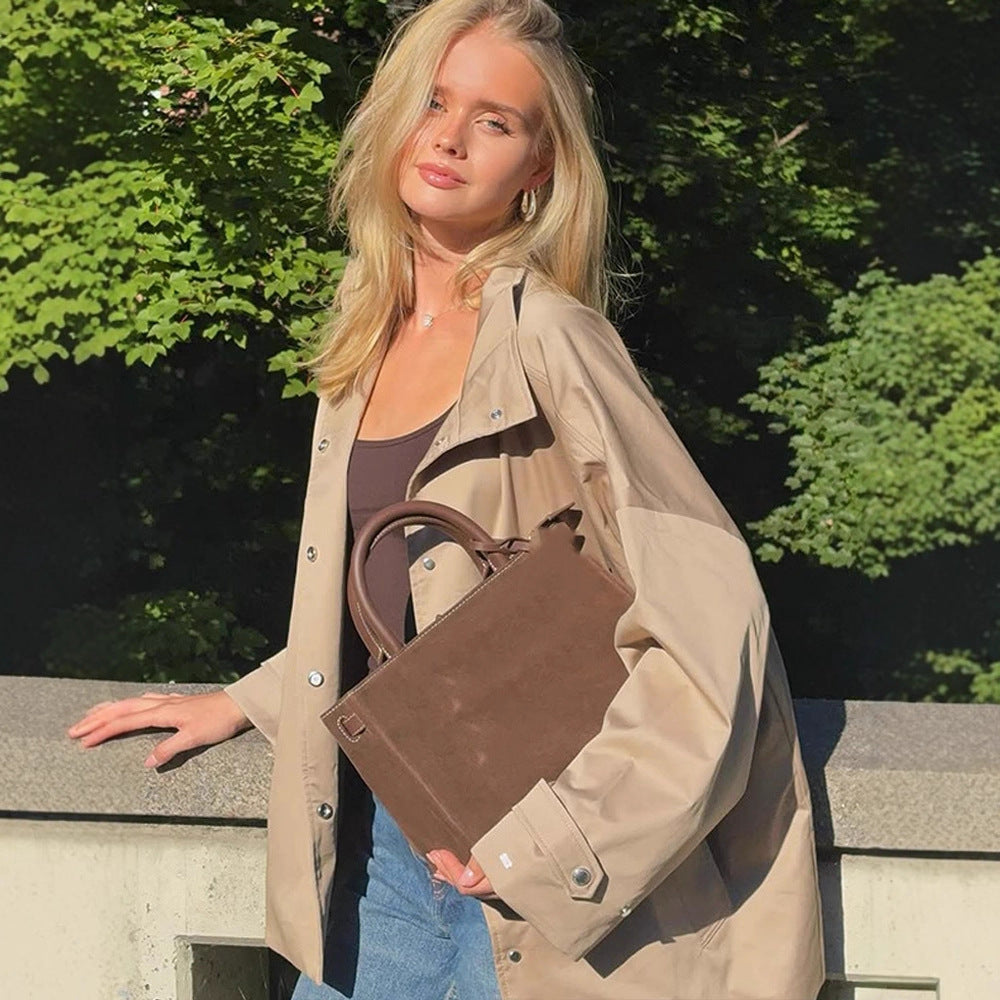 Women's oversized short coat in trench look with boxy silhouette and concealed snap button placket Chichicherry