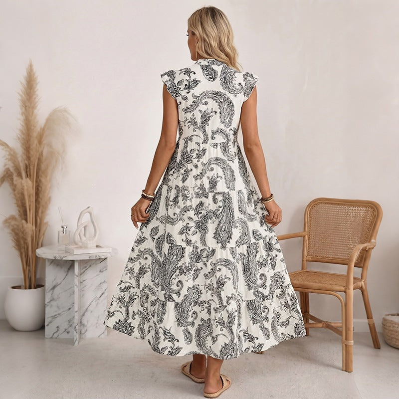Women's maxi dress with paisley print, V-neck and tiered skirt Chichicherry
