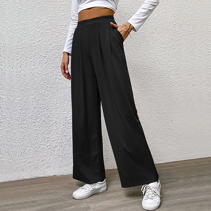 Ladies high-waisted wide trousers with front pleats, elastic waistband and side pockets Chichicherry