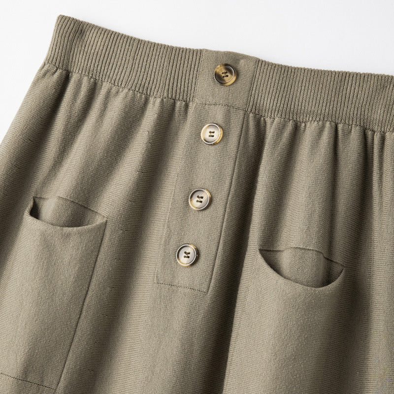 Women's midi skirt made of wool blend with A-line, elastic ribbed waistband, decorative button placket, and patch pockets Chichicherry