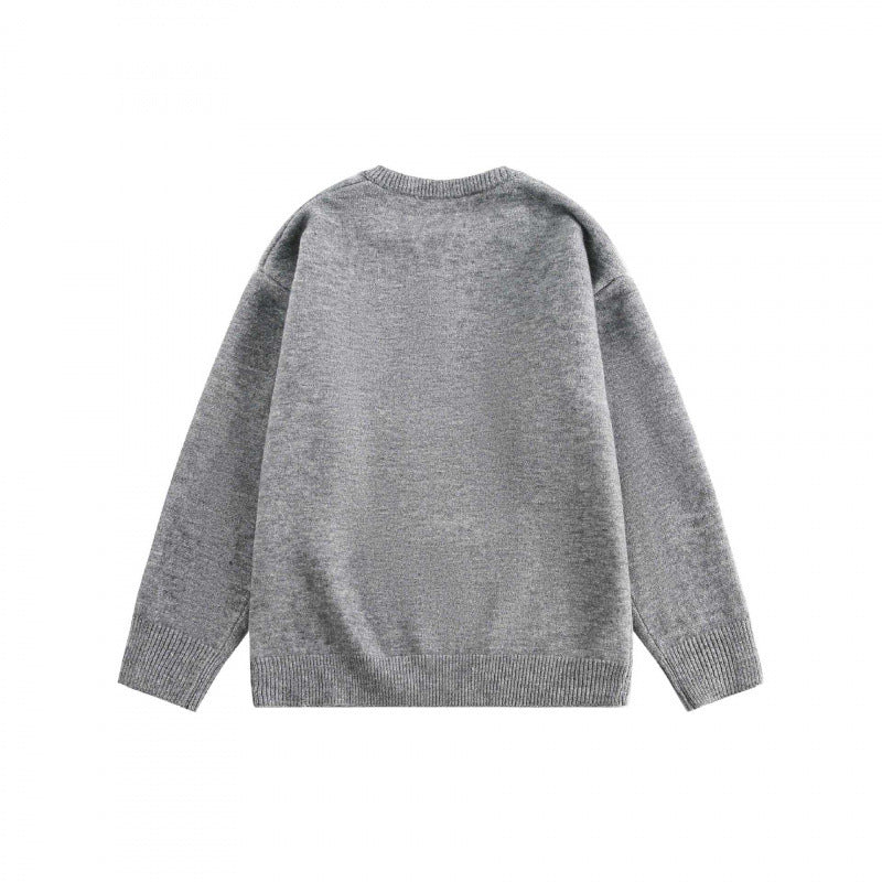 Unisex Boxy fine knit pullover with half Henley opening, round neck and ribbed finishes Chichicherry