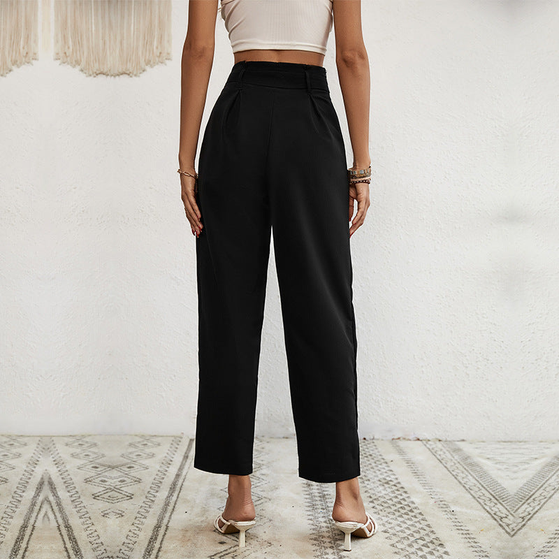 Ladies high-waisted paperbag trousers with tie belt, tapered leg and decorative button placket Chichicherry