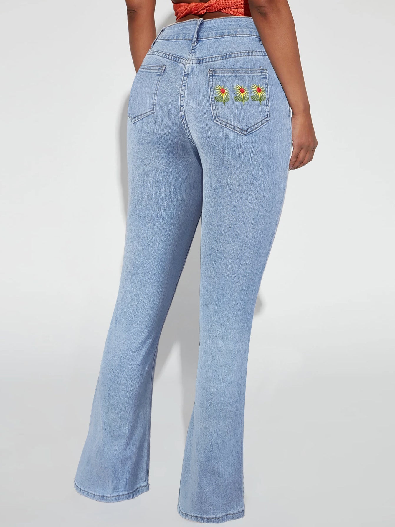 Women's high-waisted flared jeans with daisy embroidery and shaping cut Chichicherry