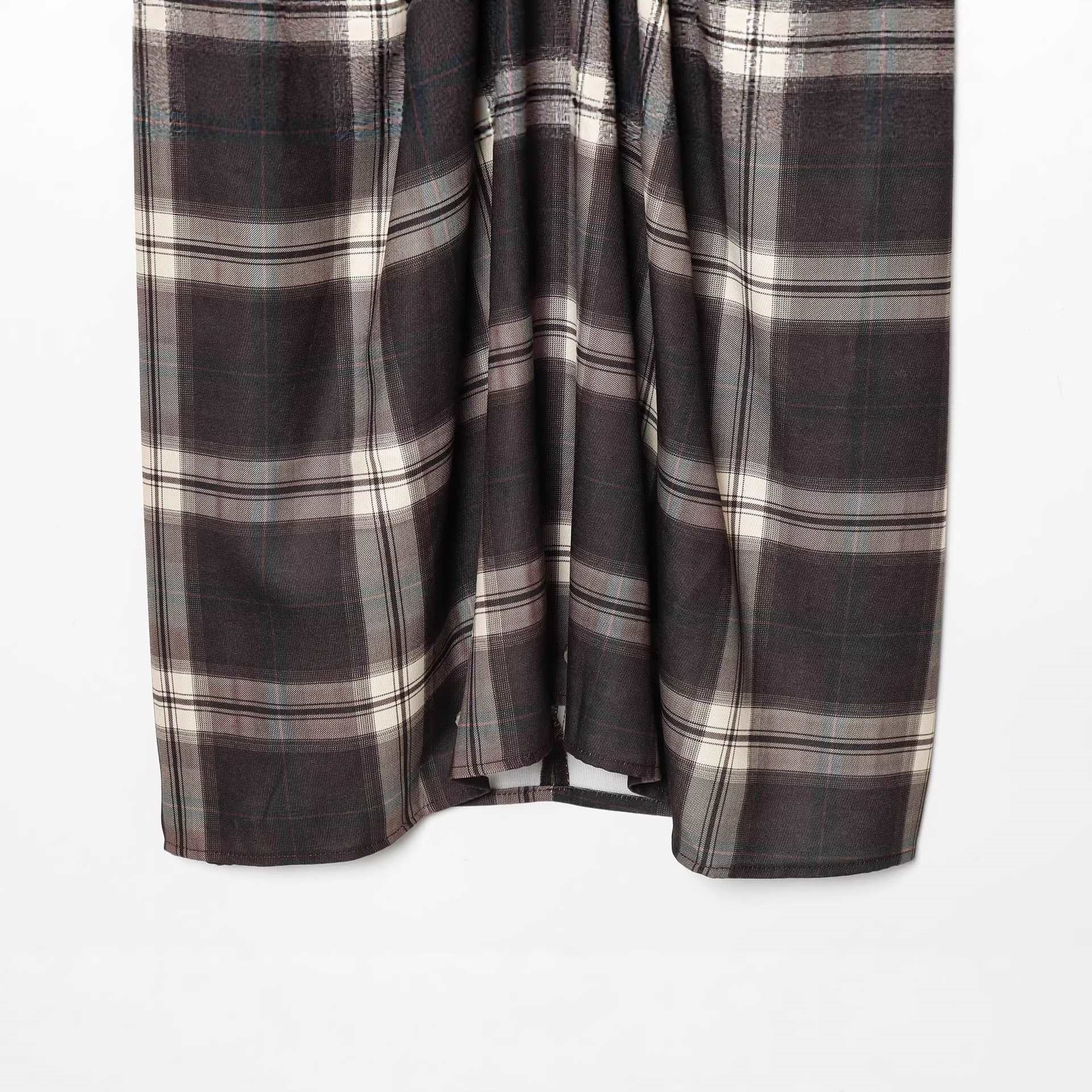 Women's midi skirt with check pattern and decorative front draping Chichicherry