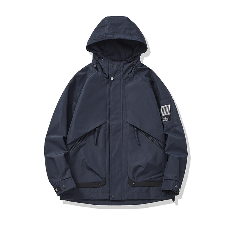 Unisex multifunctional outdoor parka in boxy cut with adjustable hood and asymmetrical zip pockets Chichicherry