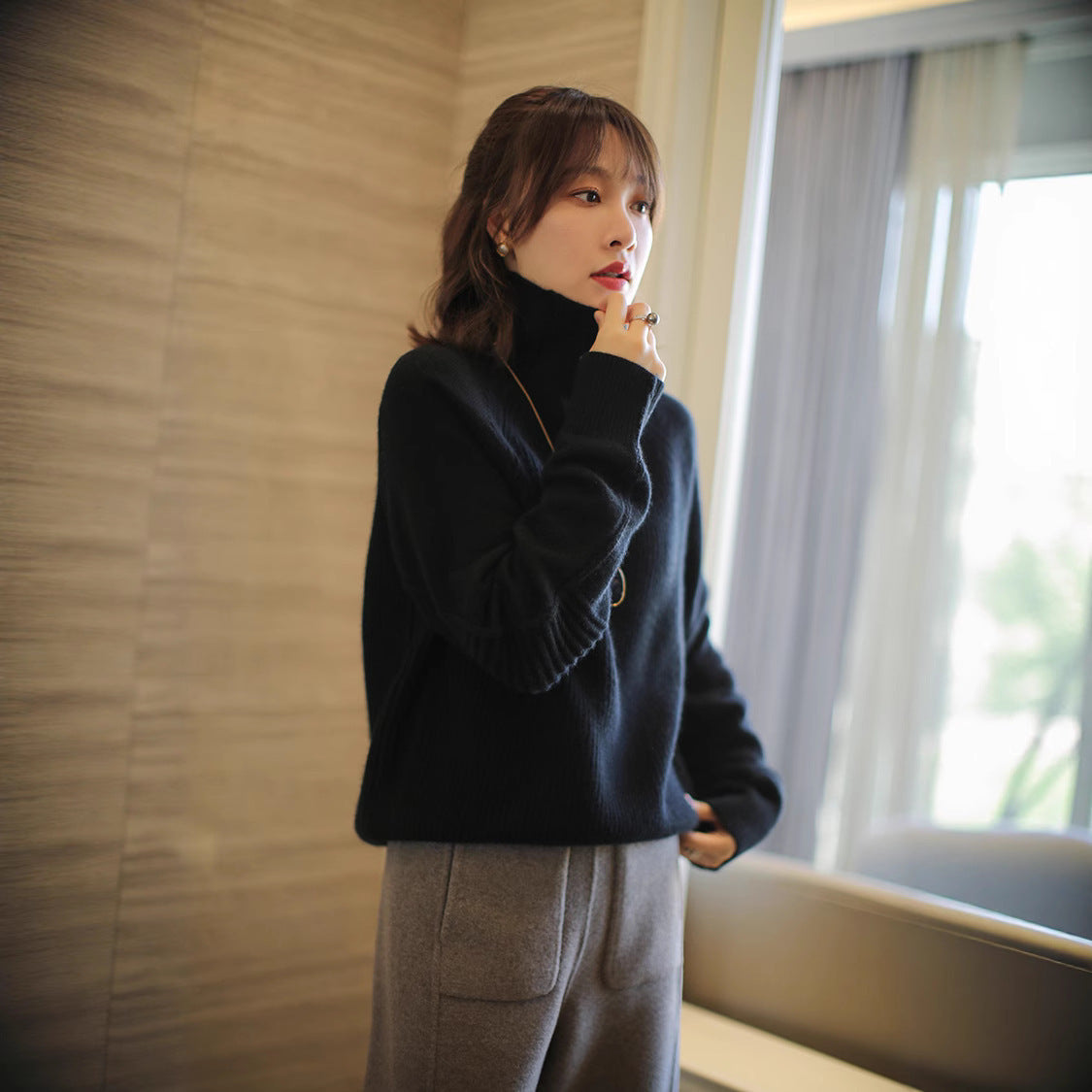 Women's turtleneck sweater made of fine ribbed knit with raglan sleeves and relaxed silhouette Chichicherry