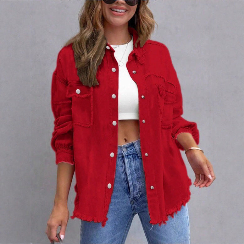 Women's oversized denim shirt jacket with fringe trim, flap pockets, and snap front Chichicherry