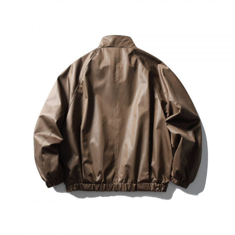 Men's short cut faux leather bomber jacket with stand-up collar, raglan sleeves, and elastic hem Chichicherry