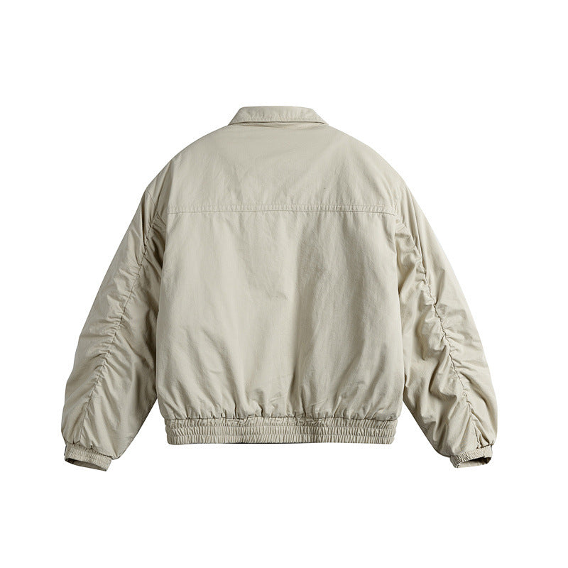 Men's short boxy blouson with shirt collar, utility chest pockets, and elastic hem Chichicherry