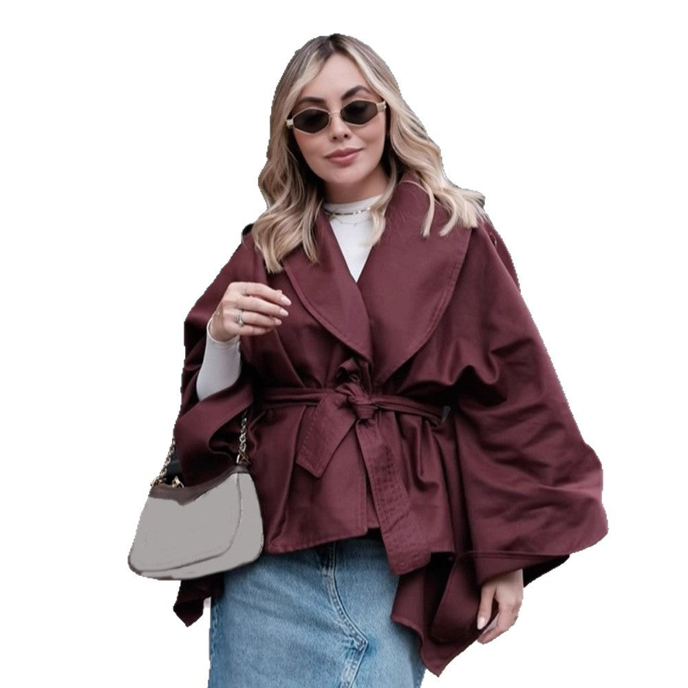 Women's short trench-style jacket with belted waist, oversized sleeves, and boxy cropped silhouette Chichicherry