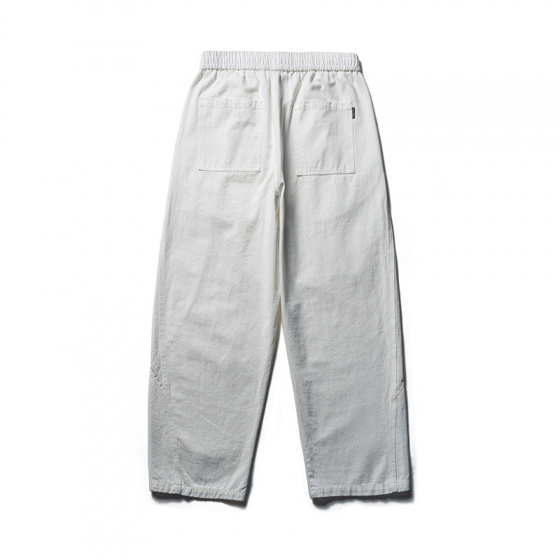 Unisex locker cut cropped leisure pants with elastic waistband, drawstring, and carabiner detail Chichicherry