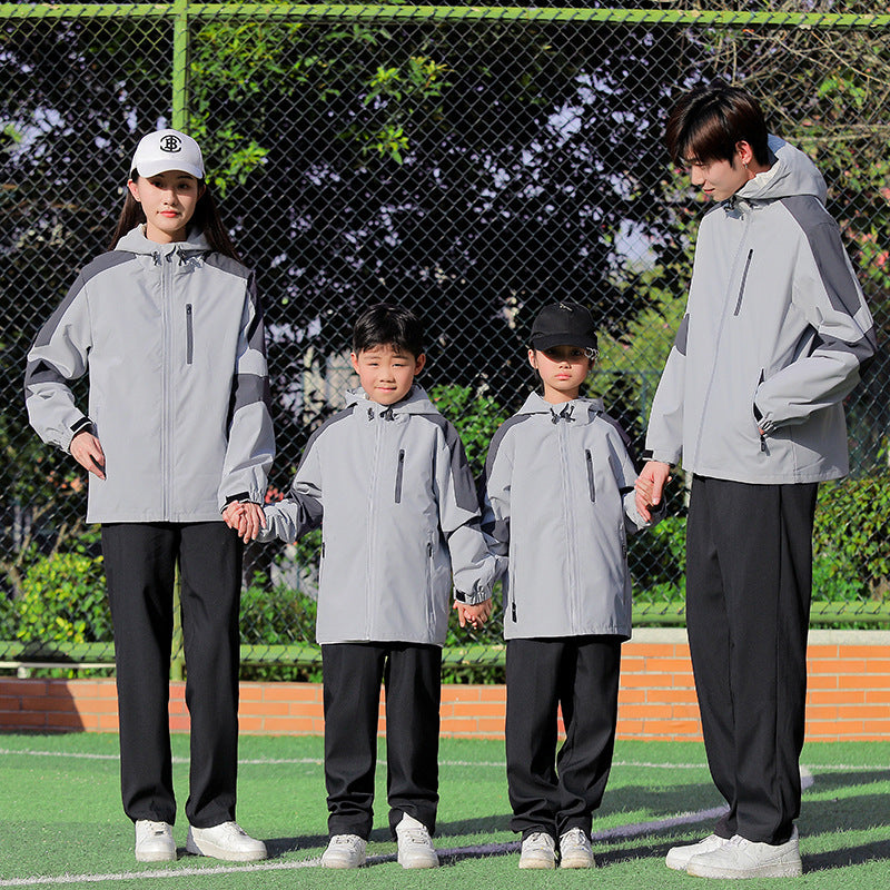 Men's sporty softshell outdoor jacket with hood, color block sleeves and water-repellent membrane Chichicherry