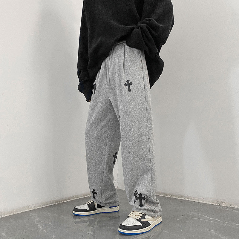 Men's wide cotton jogging pants with all-over cross print and elastic drawstring waistband Chichicherry