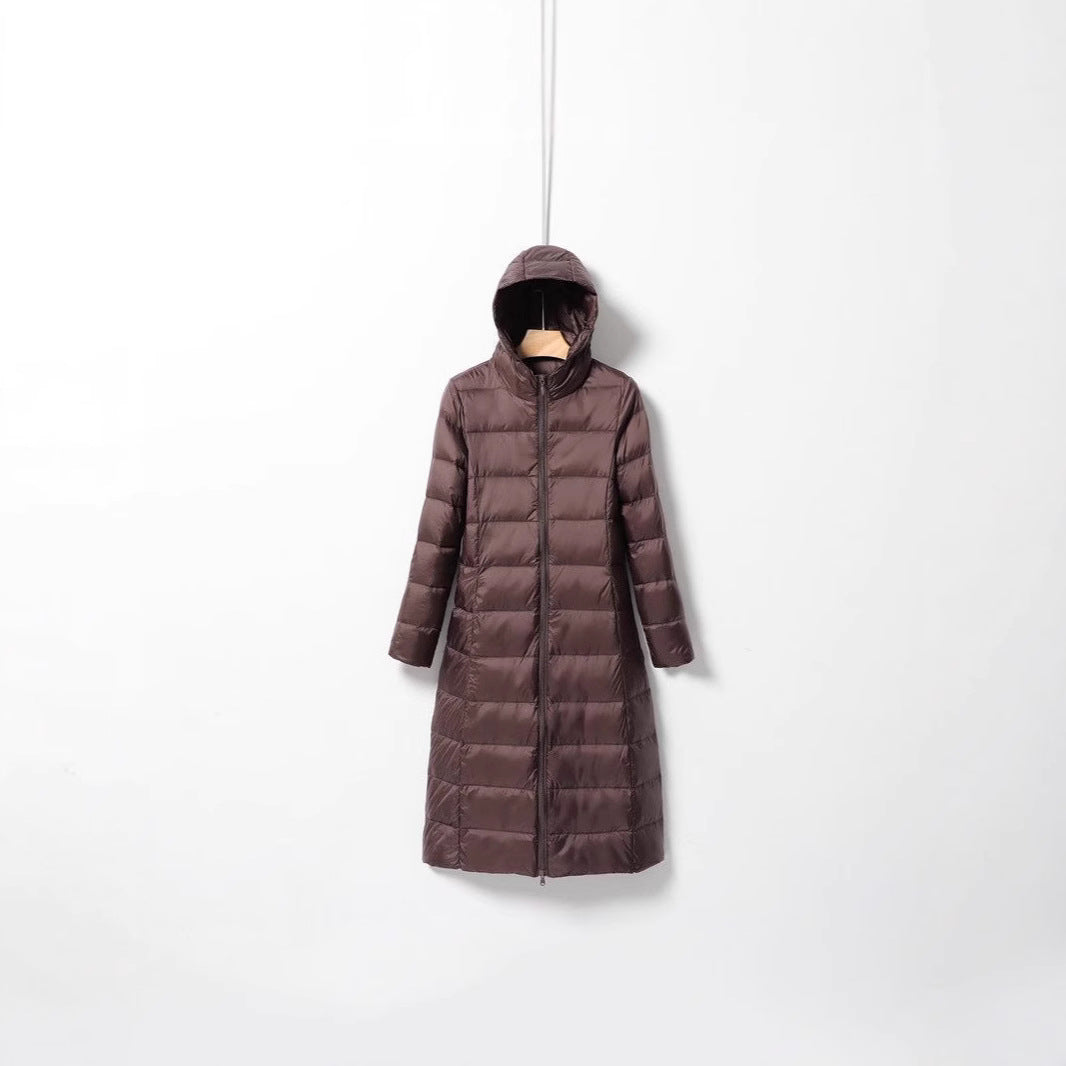 Women's longer quilted coat with hood and light thermal insulation Chichicherry