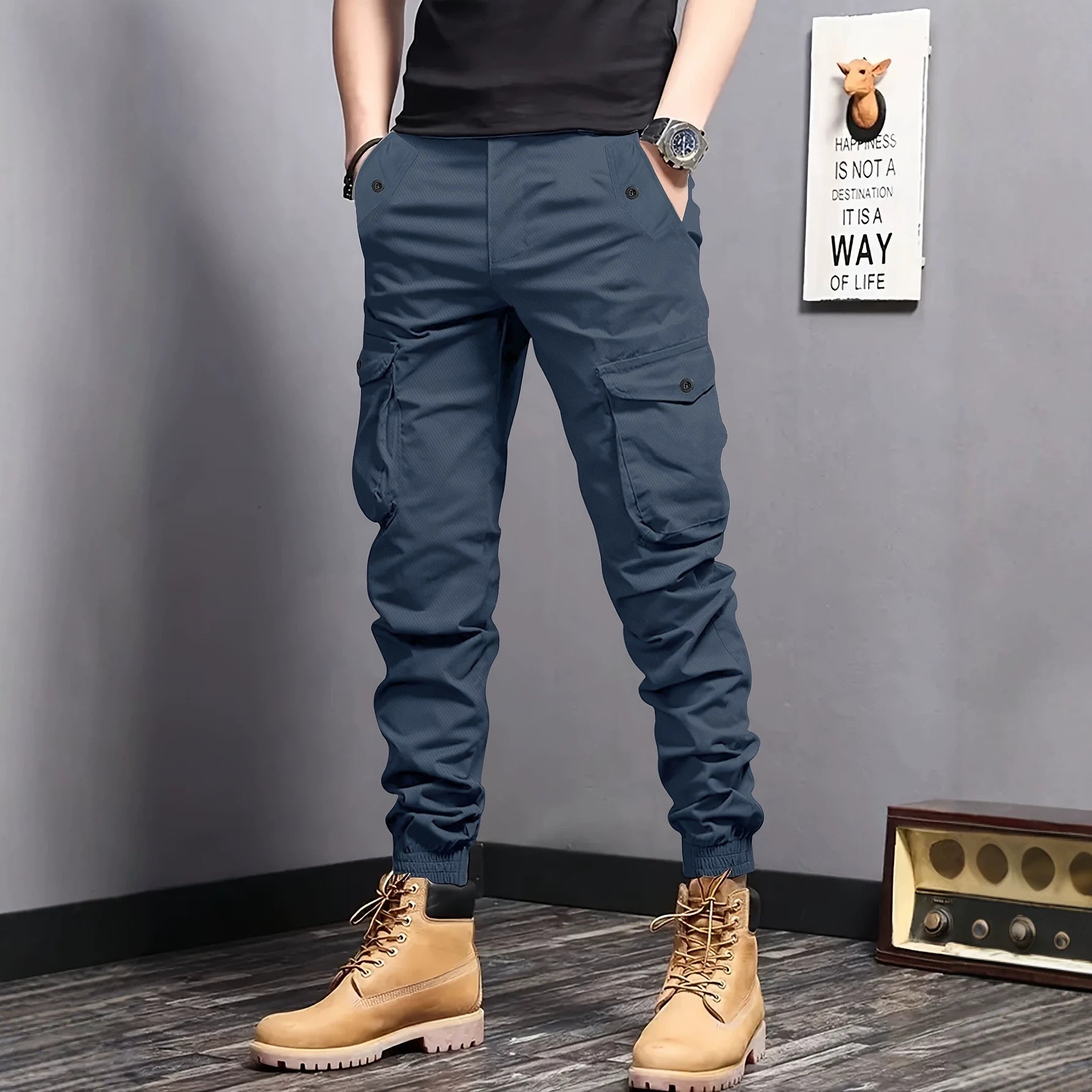 Men's cargo jogger pants with elastic waistband, drawstring, and multifunctional pockets.