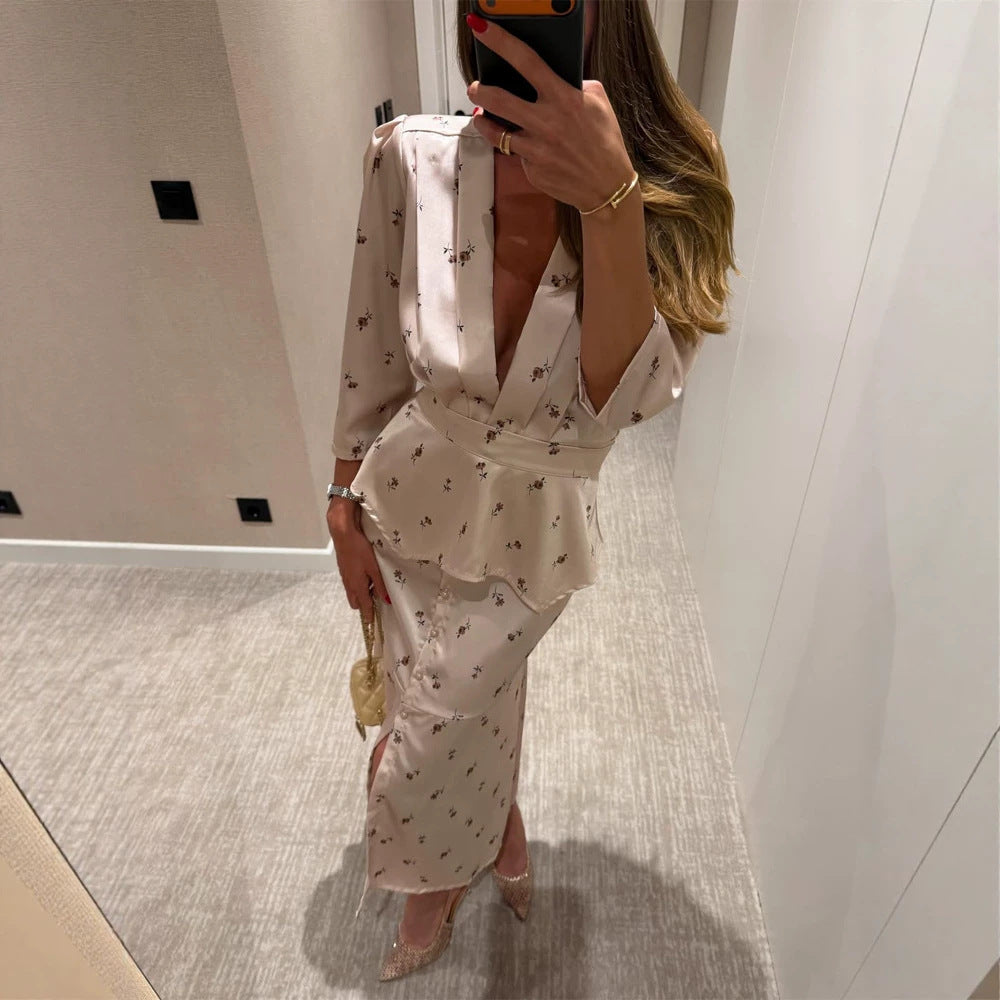 Women's satin two-piece set with tailored peplum top, deep V-neckline and button-up midi skirt Chichicherry