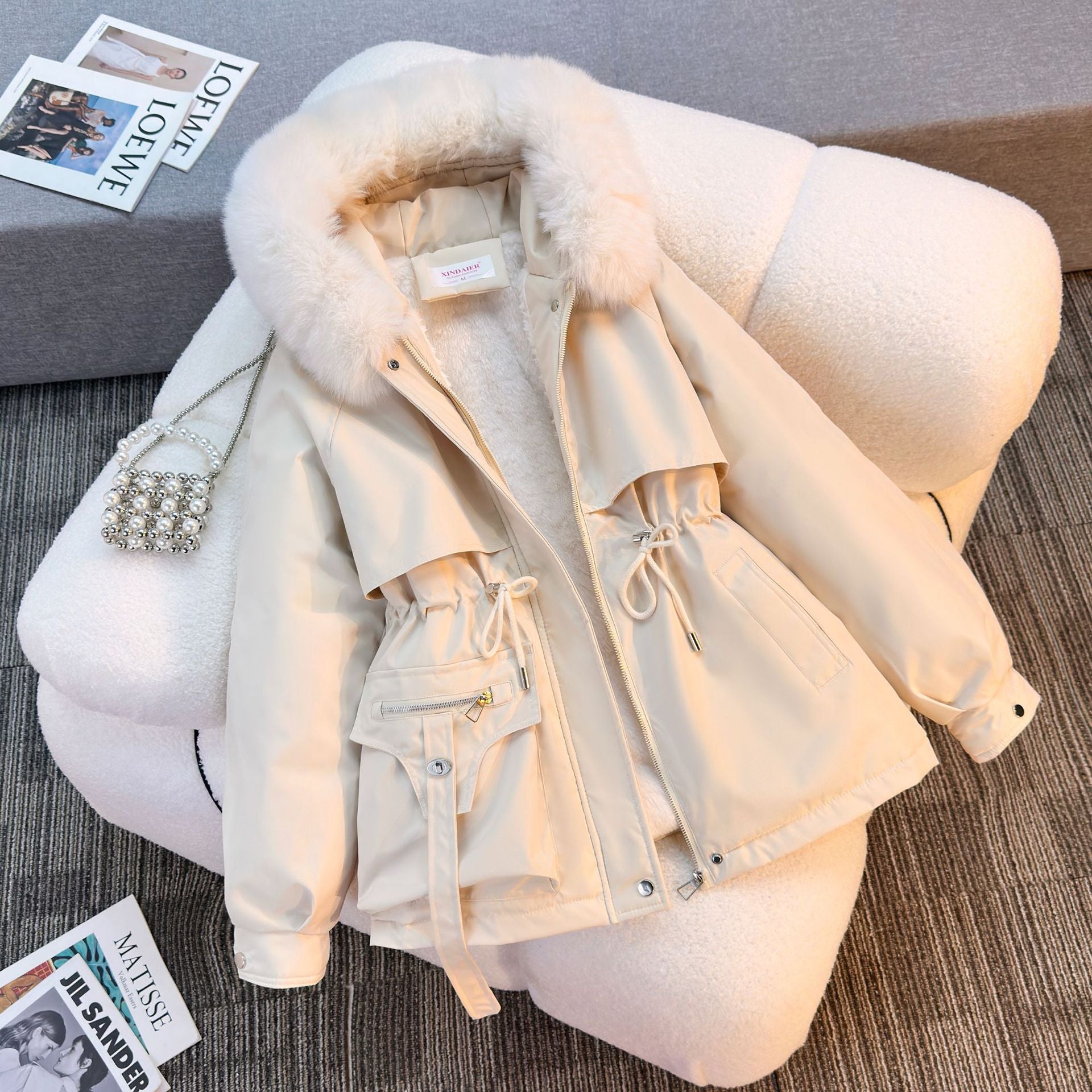 Women's padded parka with removable faux fur collar, drawstring waist and zippered pockets Chichicherry