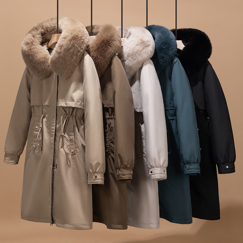 Women's longer water-repellent parka with voluminous faux fur hood, adjustable drawstring waist, and quilted thermal inner jacket Chichicherry