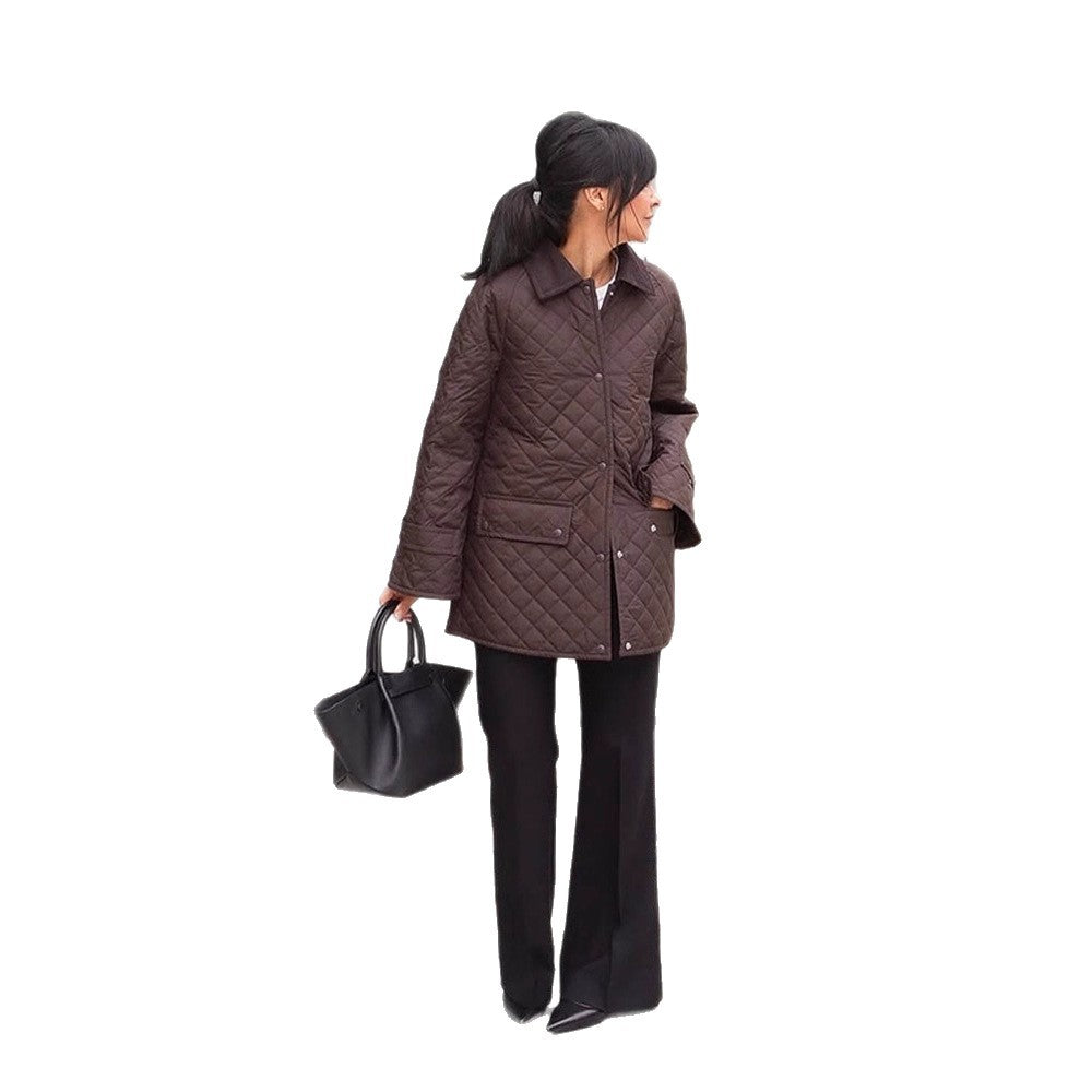 Women's oversized quilted jacket in coat style with snap button placket and patch flap pockets Chichicherry