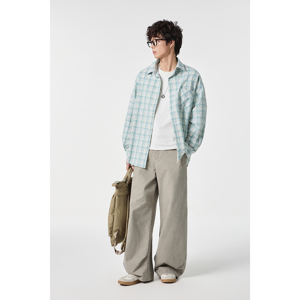 Unisex Oversize Check Shirt Jacket made of lightweight cotton blend with a patch chest pocket Chichicherry