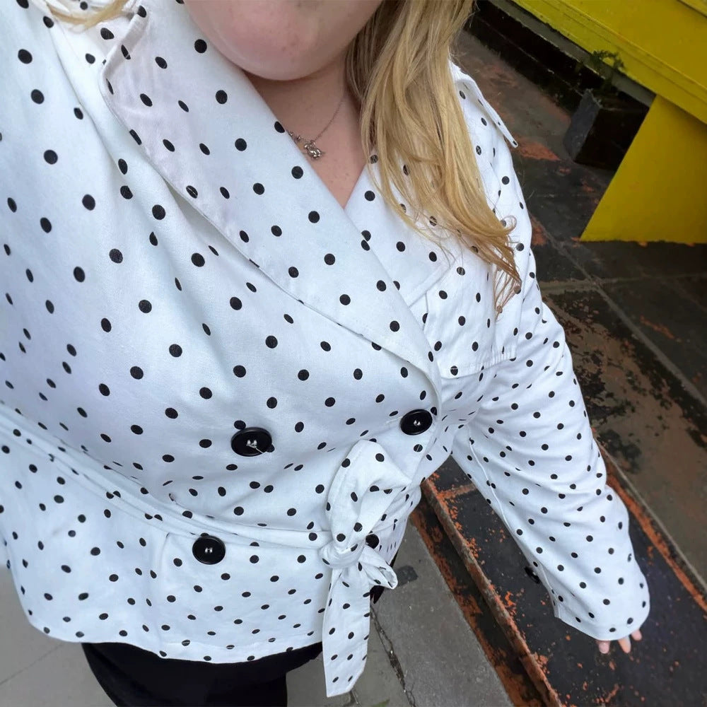 Women’s short trench coat with double breasted front, belt at the waist and polka dot print Chichicherry
