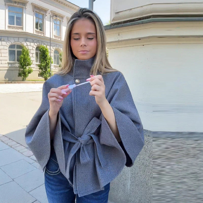 Women's short cape coat made of wool blend with stand-up collar, wide kimono sleeves, and tie belt Chichicherry
