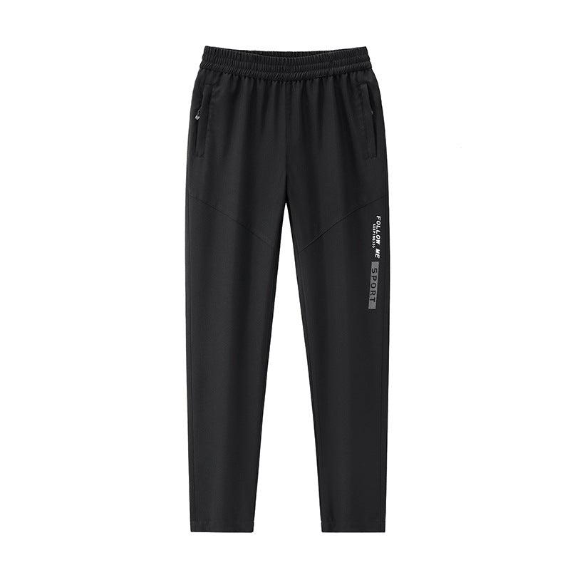Men's Sportive Tapered Jogging Pants with Elastic Waistband, Zipper Pockets and Breathable Functional Material Chichicherry