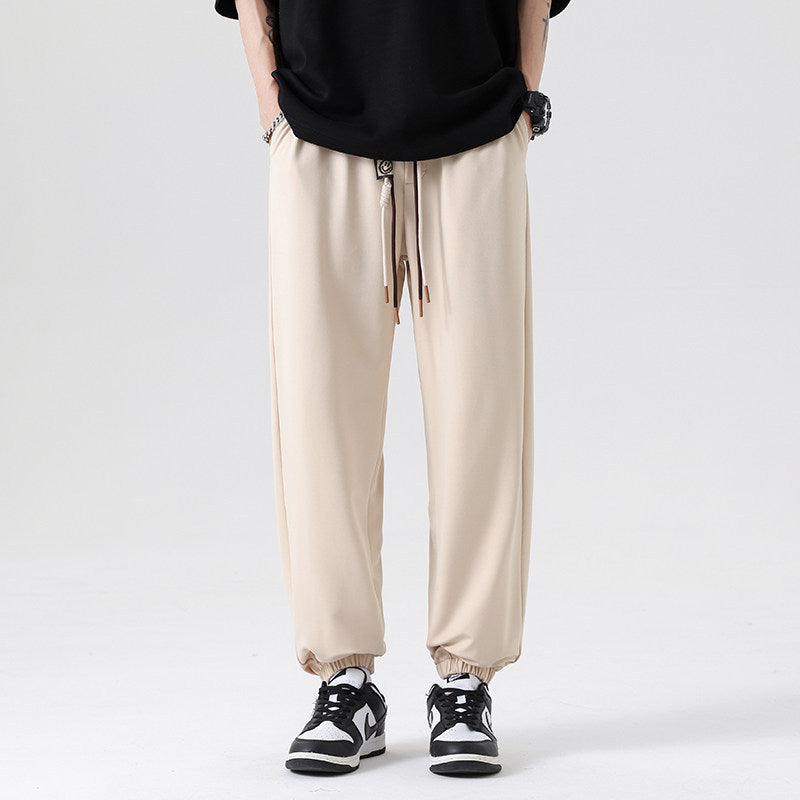 Men's Wide Jogging Pants in a Loose Fit with Adjustable Drawstring, Elastic Ankle Cuffs, and Soft Touch Chichicherry
