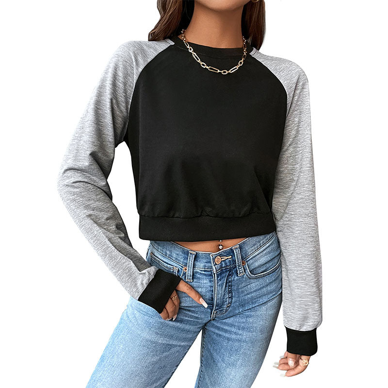 Women's short cut raglan sweatshirt with thumb hole cuffs and elastic hem Chichicherry