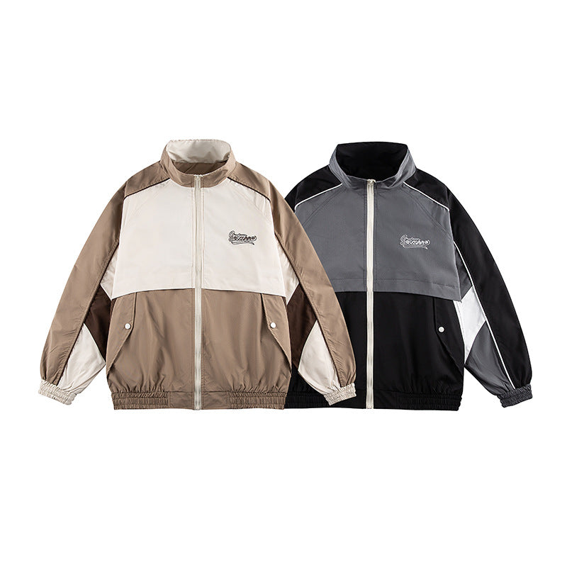 Unisex Classically Cut Track Jacket in Retro Sports Style with High Stand-Up Collar, Color Block Inserts and Elastic Hem Chichicherry