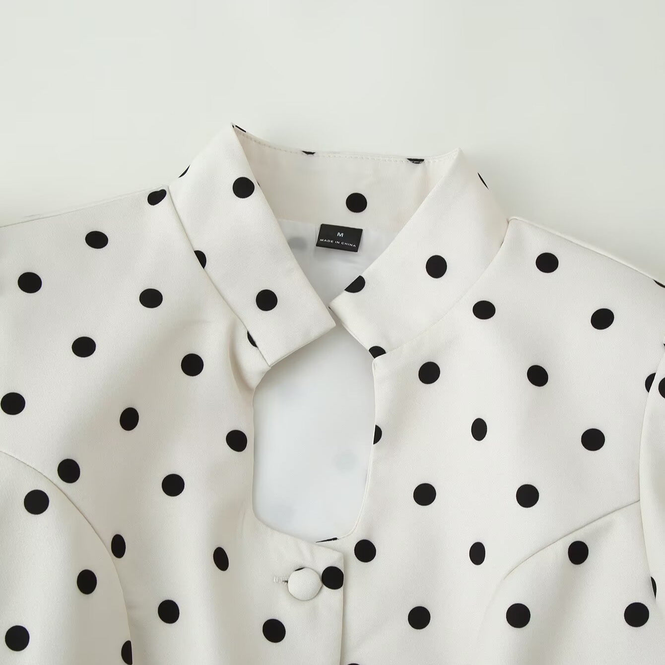 Women's Polka Dot Blouse with Stand Collar, Puff Sleeves, and Peplum Hem Chichicherry