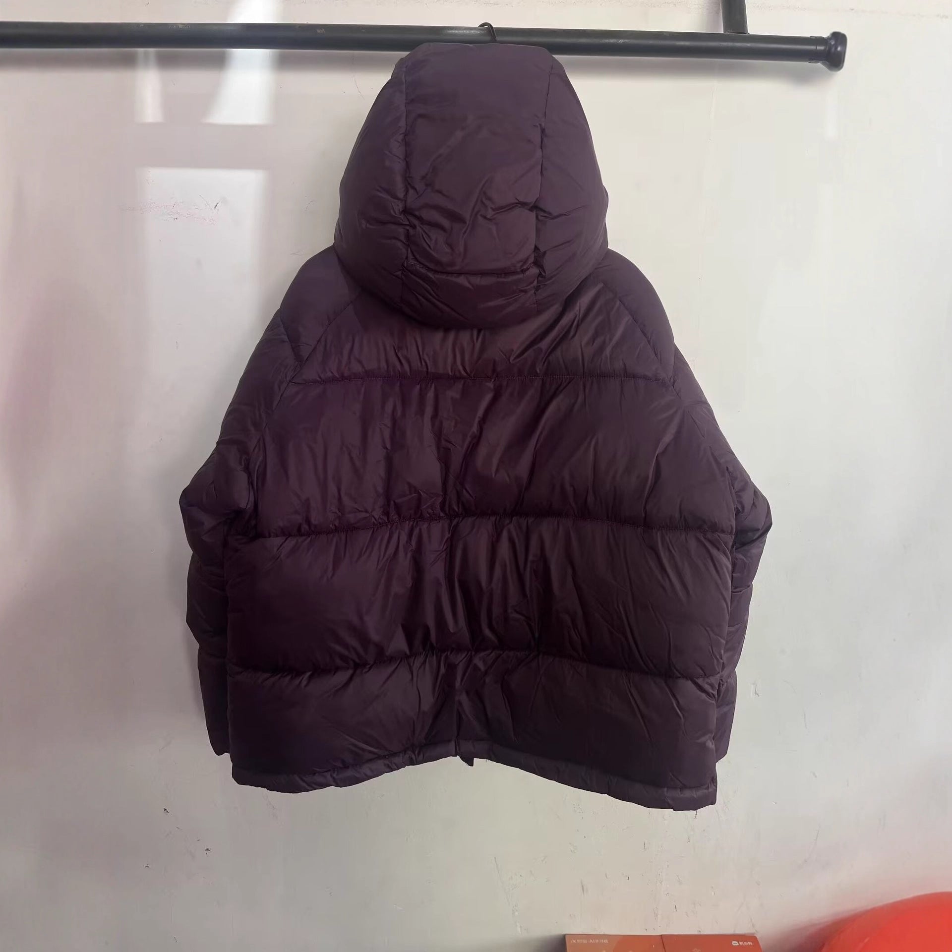 Women's short cut oversized quilted jacket with high collar and hood Chichicherry