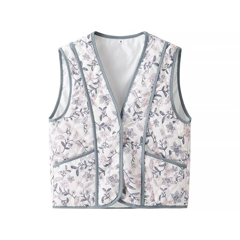 Women's light quilted vest with floral print, V-neck and side pockets Chichicherry