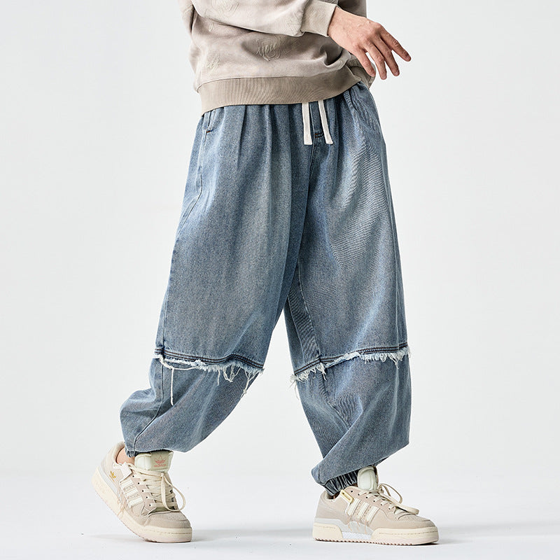Men Wide-cut Baggy Denim Pants with Drawstring, Elastic Leg Openings and Fringed Detail Chichicherry