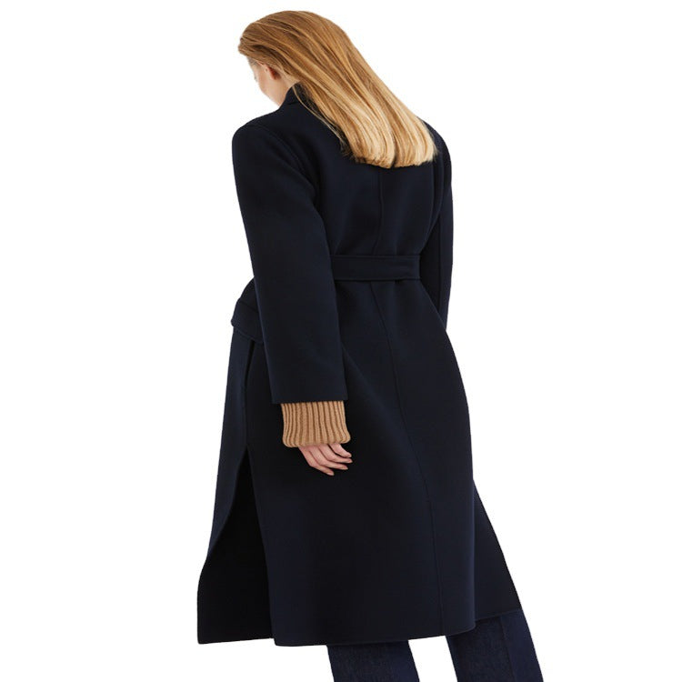 Women's long coat in a minimalist coat dress look with concealed double row and fabric belt Chichicherry