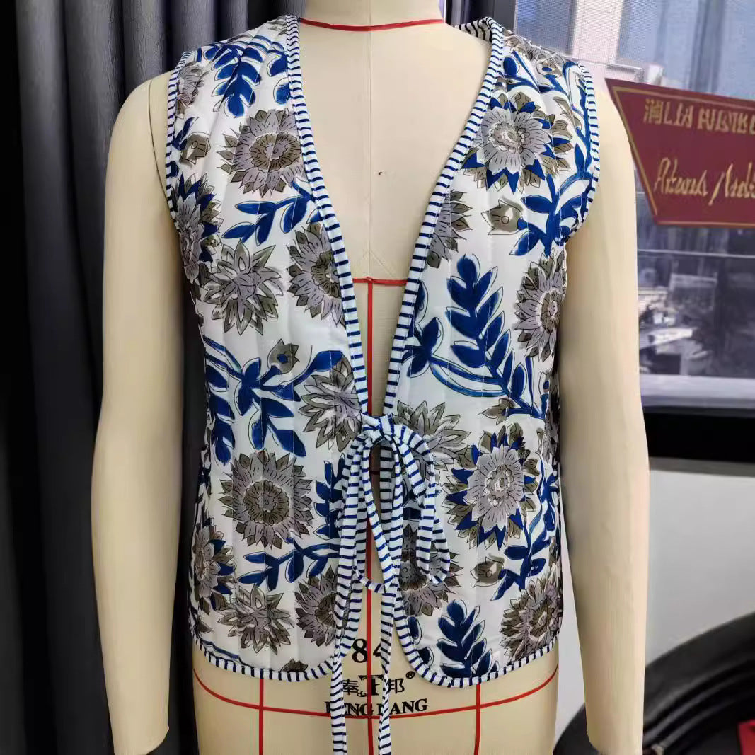 Ladies patchwork vest with tie belt, striped interior finish and contrast piping Chichicherry