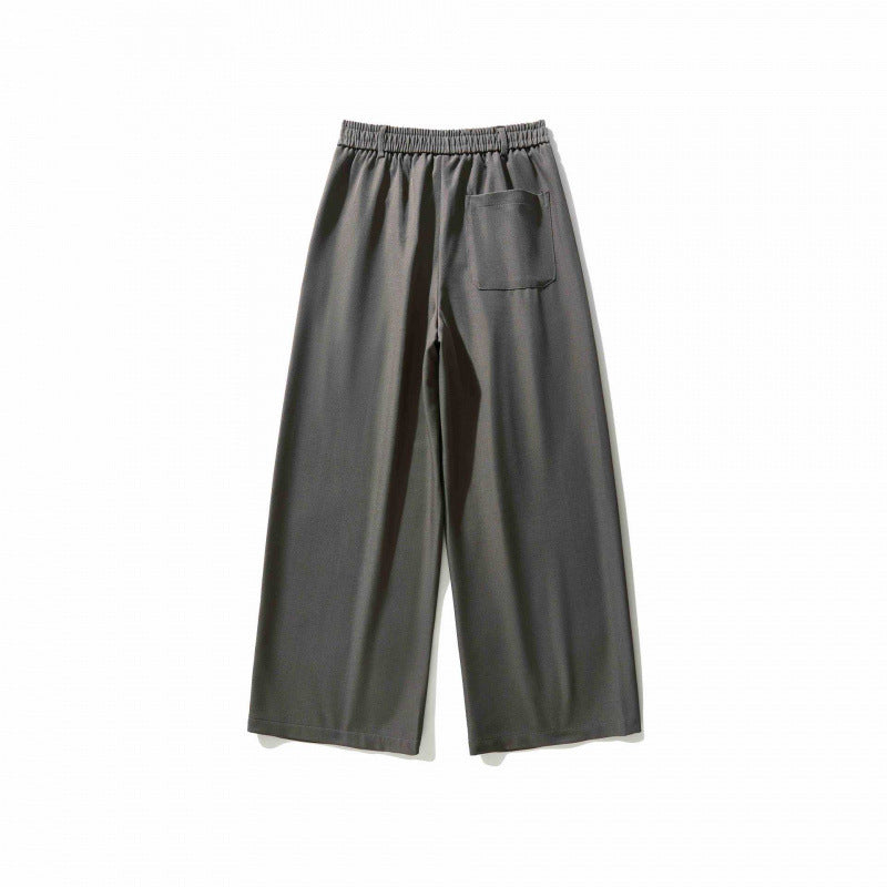 Women's wide culotte pants with knife pleats, high waistband, and decorative button detail Chichicherry