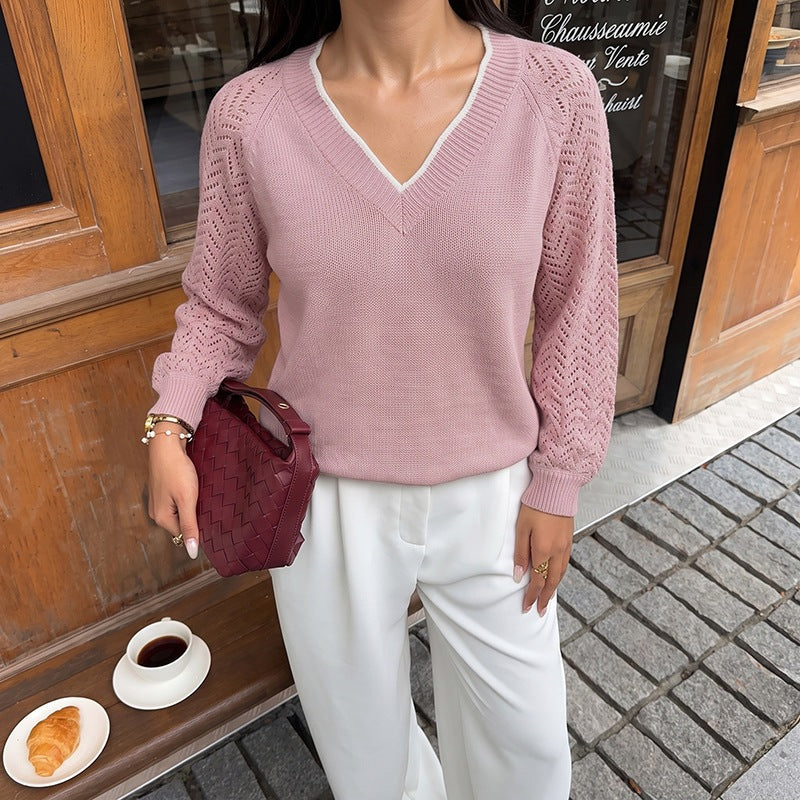Women's fine knit sweater with deep V-neck, openwork sleeves, and ribbed hem Chichicherry