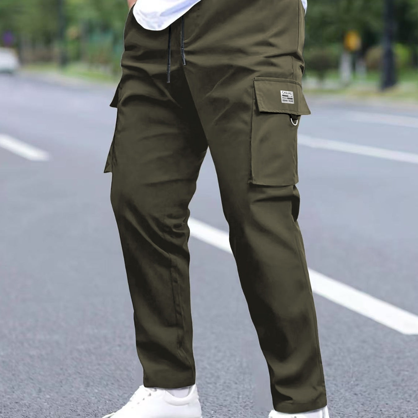 Men's utility cargo pants in a tapered cut with elastic drawstring waistband, large flap and zip pockets Chichicherry