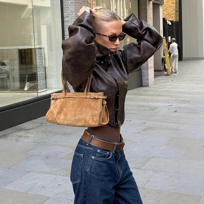 Women's short jacket made of faux leather with a high stand-up collar, shoulder flaps, and tailored silhouette Chichicherry