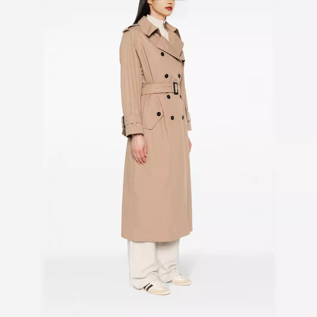 Women's trench coat in maxi length with double-breasted button placket and waist belt Chichicherry