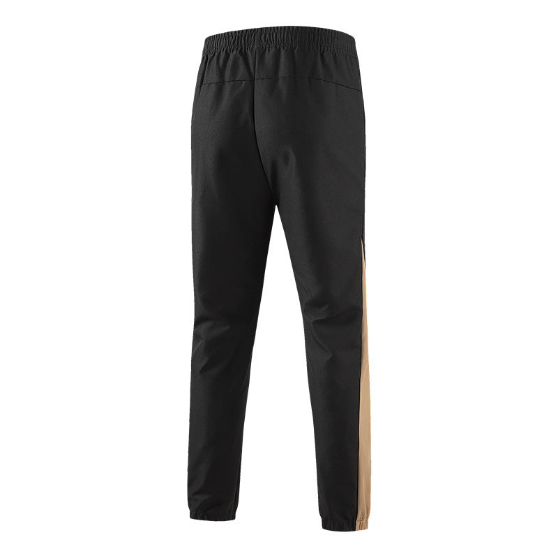 Men's Breathable Training Pants with Elastic Waistband, Zipper Pockets and Side Contrast Stripes Chichicherry