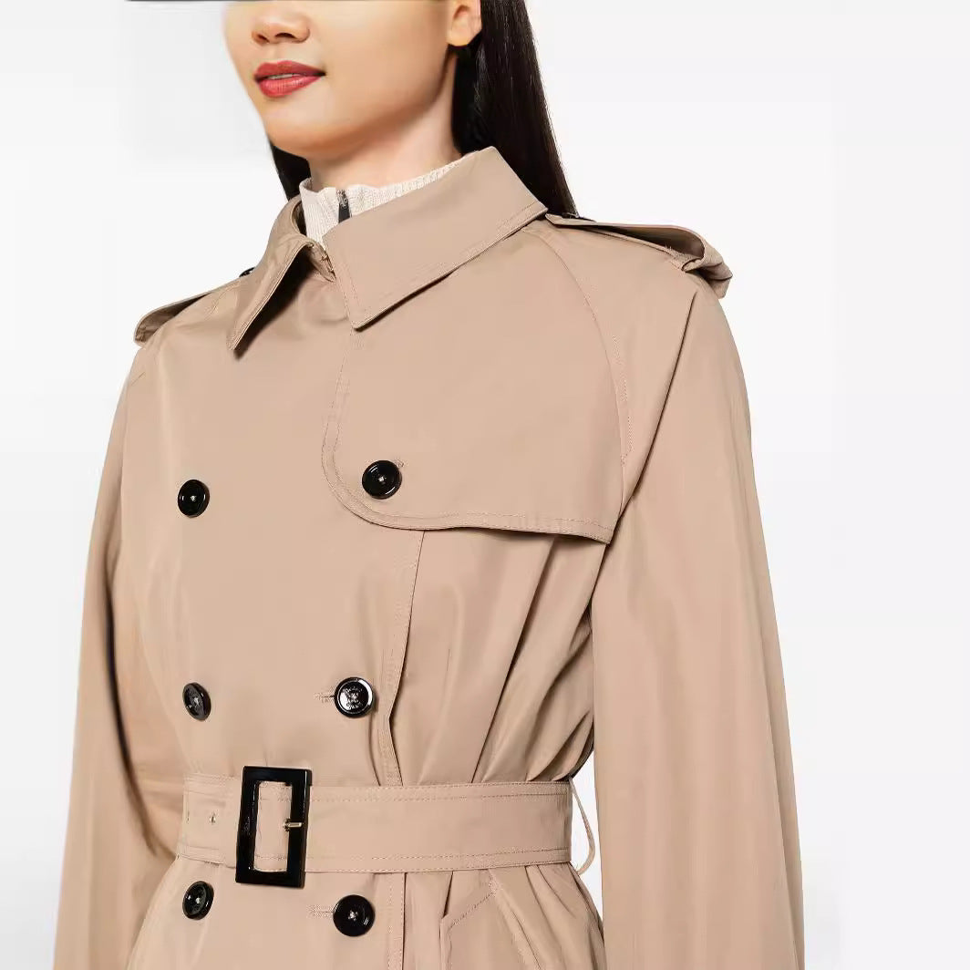 Women's trench coat in maxi length with double-breasted button placket and waist belt Chichicherry
