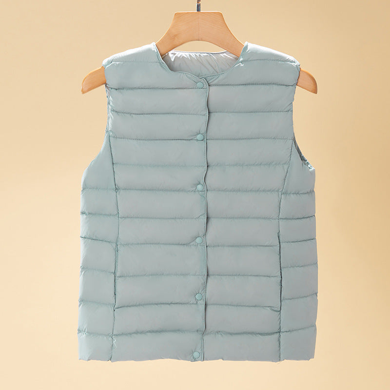 Women's sleeveless quilted thermal vest with round neck and snap button placket Chichicherry