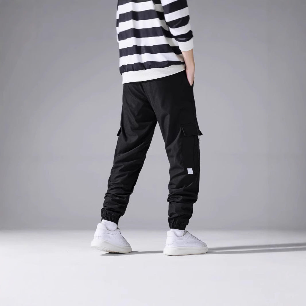 Men's cargo joggers with elastic ankle cuffs, multiple pockets & reflective applications Chichicherry