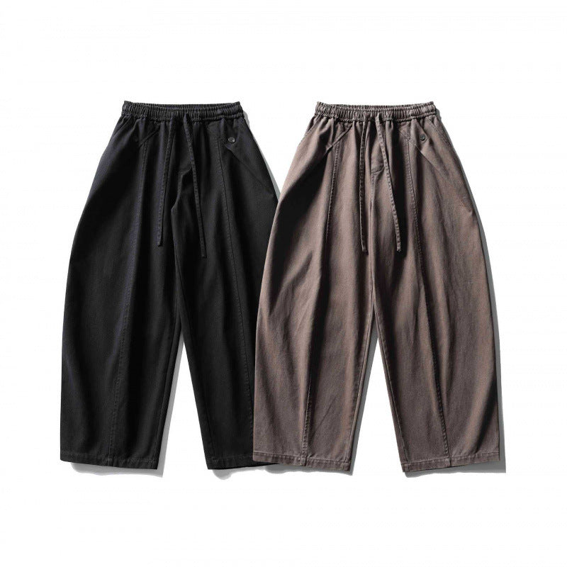 Unisex wide balloon pants made of cotton blend with drawstring waistband and decorative darts Chichicherry